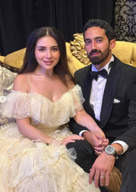 مي عز الدين وزوجها