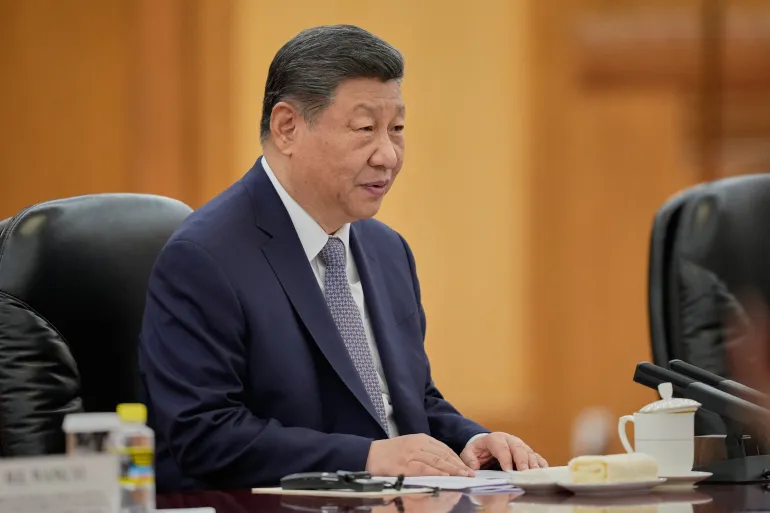 China's President Xi Jinping speaks during a meeting with Britain's Prime Minister Keir Starmer at the Great Hall of the People in Beijing on January 29, 2026.