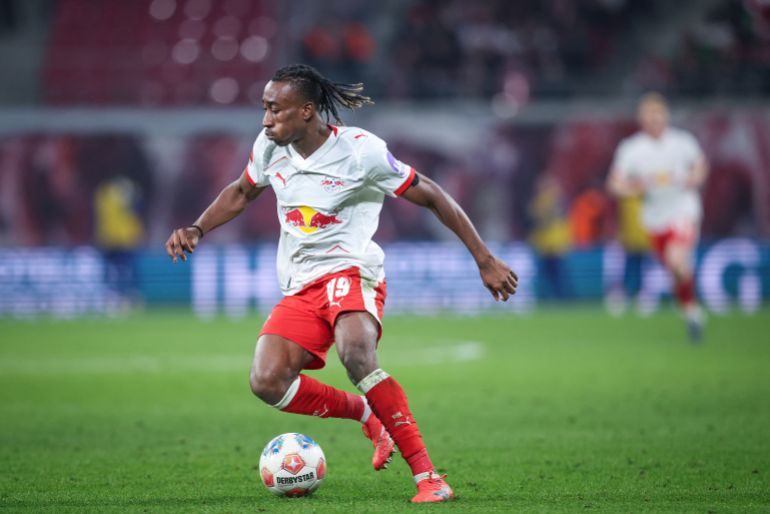 Leipzig's Ivorian forward #49 Yan Diomande plays the ball during the German first division Bundesliga football match between RB Leipzig and TSG 1899 Hoffenheim in Leipzig, eastern Germany, on March 20, 2026. (Photo by Ronny HARTMANN / AFP) / DFL REGULATIONS PROHIBIT ANY USE OF PHOTOGRAPHS AS IMAGE SEQUENCES AND/OR QUASI-VIDEO
