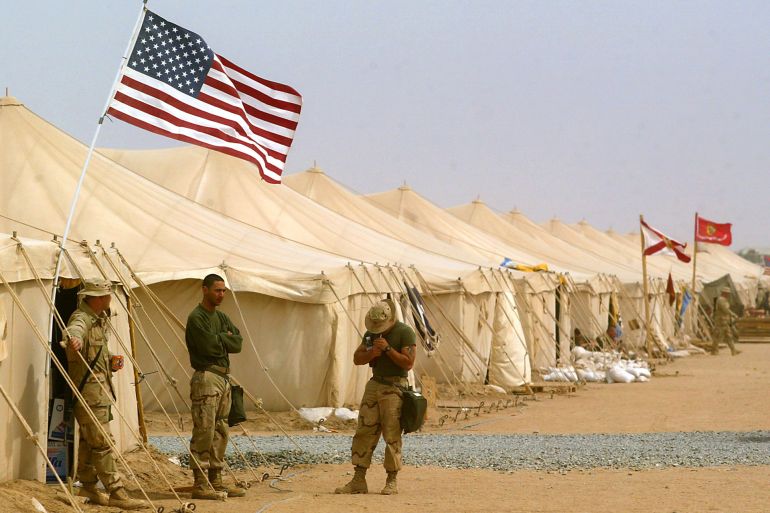 FG.desolate.1.RL––Kuwait––Rows of tents house troops and equipment in the stark desert environment of Camp Matilda in Kuwait which is roughly 30 miles from the Iraqi border. Troops have been gathering and training there in the event of a U.S. led war against Iraq. (Photo by Rick Loomis/Los Angeles Times via Getty Images)
